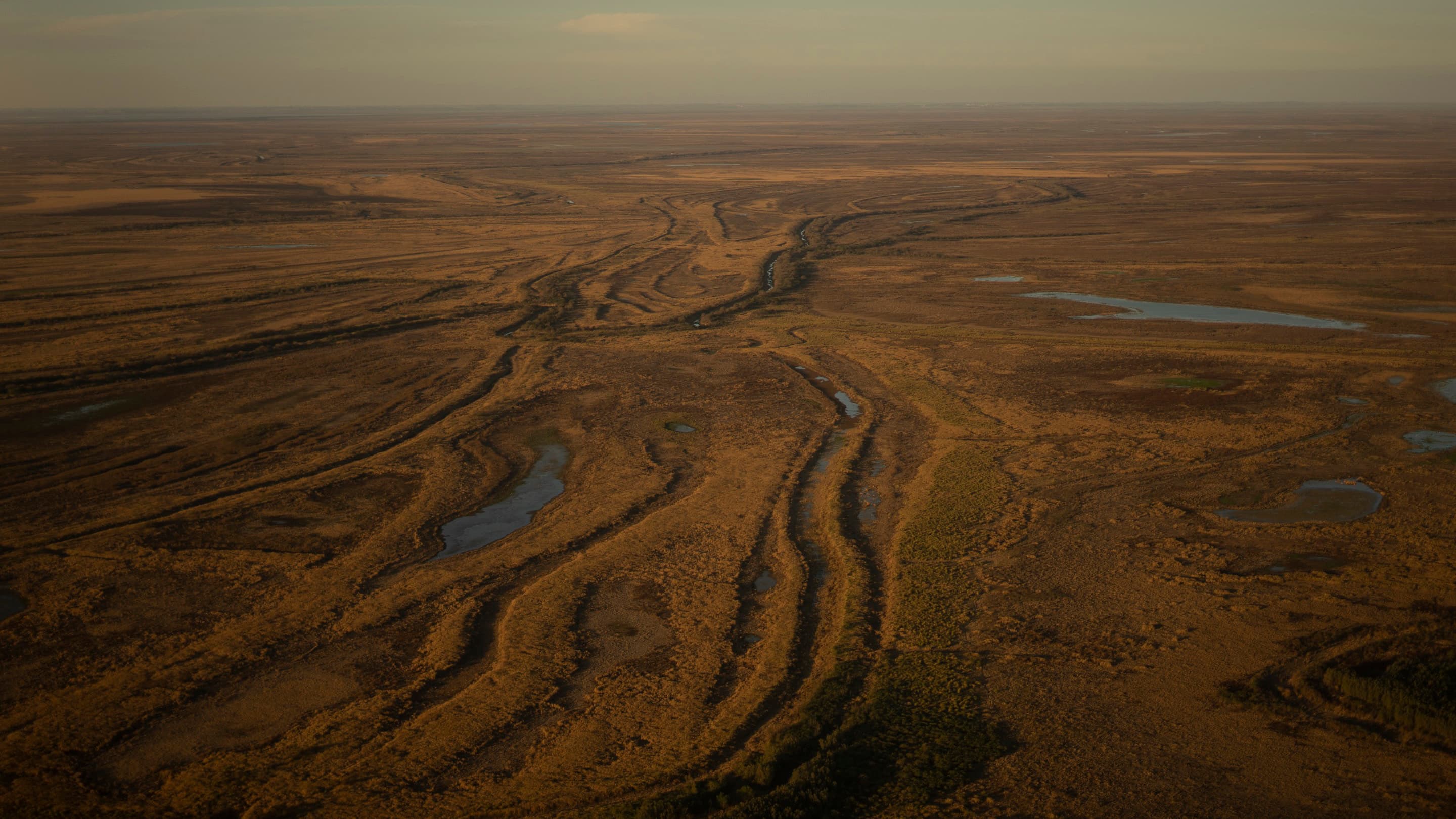 Aerial view of the landscape surrounding the dried-up Paraná River in Argentina.