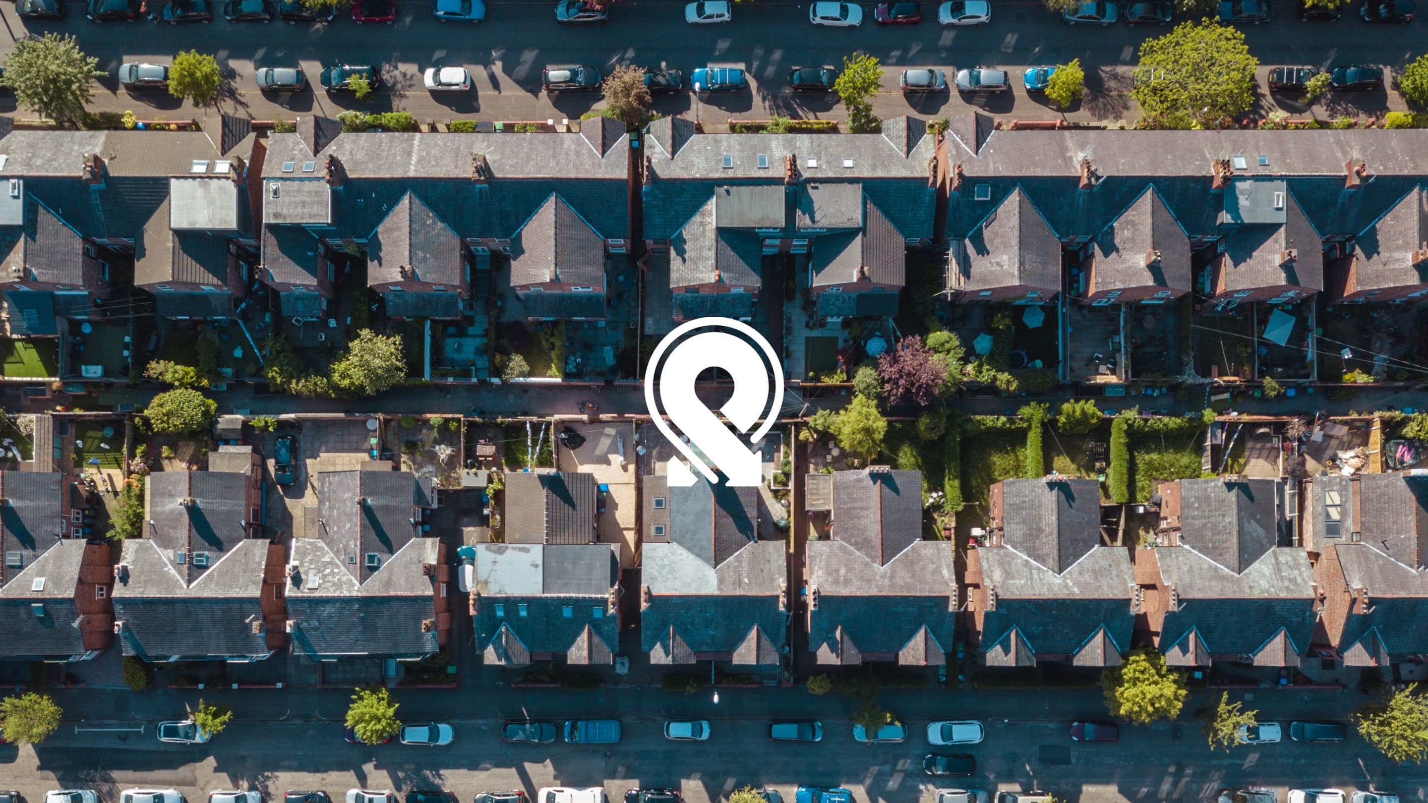 Aerial image of terraced houses overlaid with the ProxyAddress logo.
