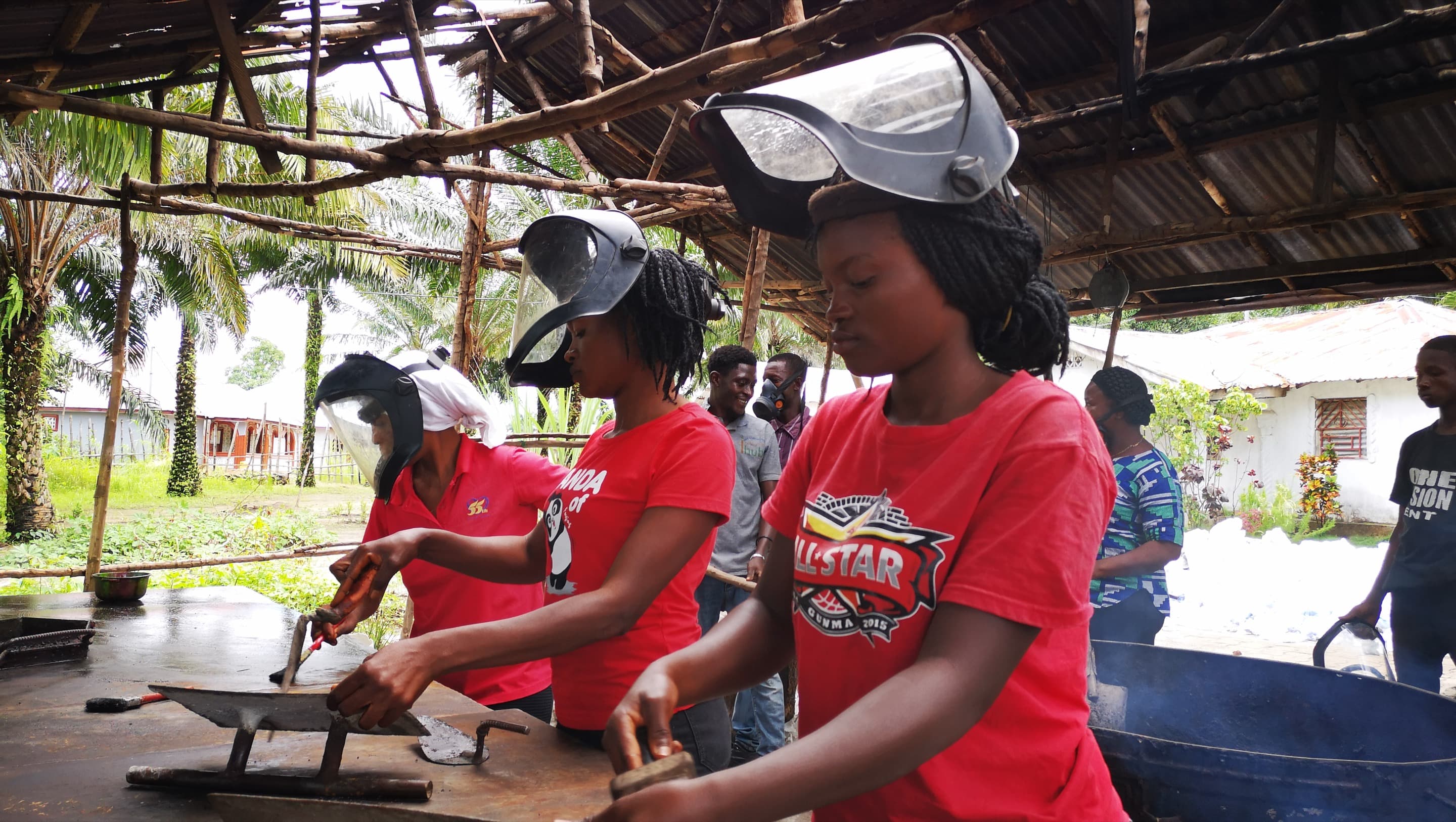 The Ecovironment team making tiles.