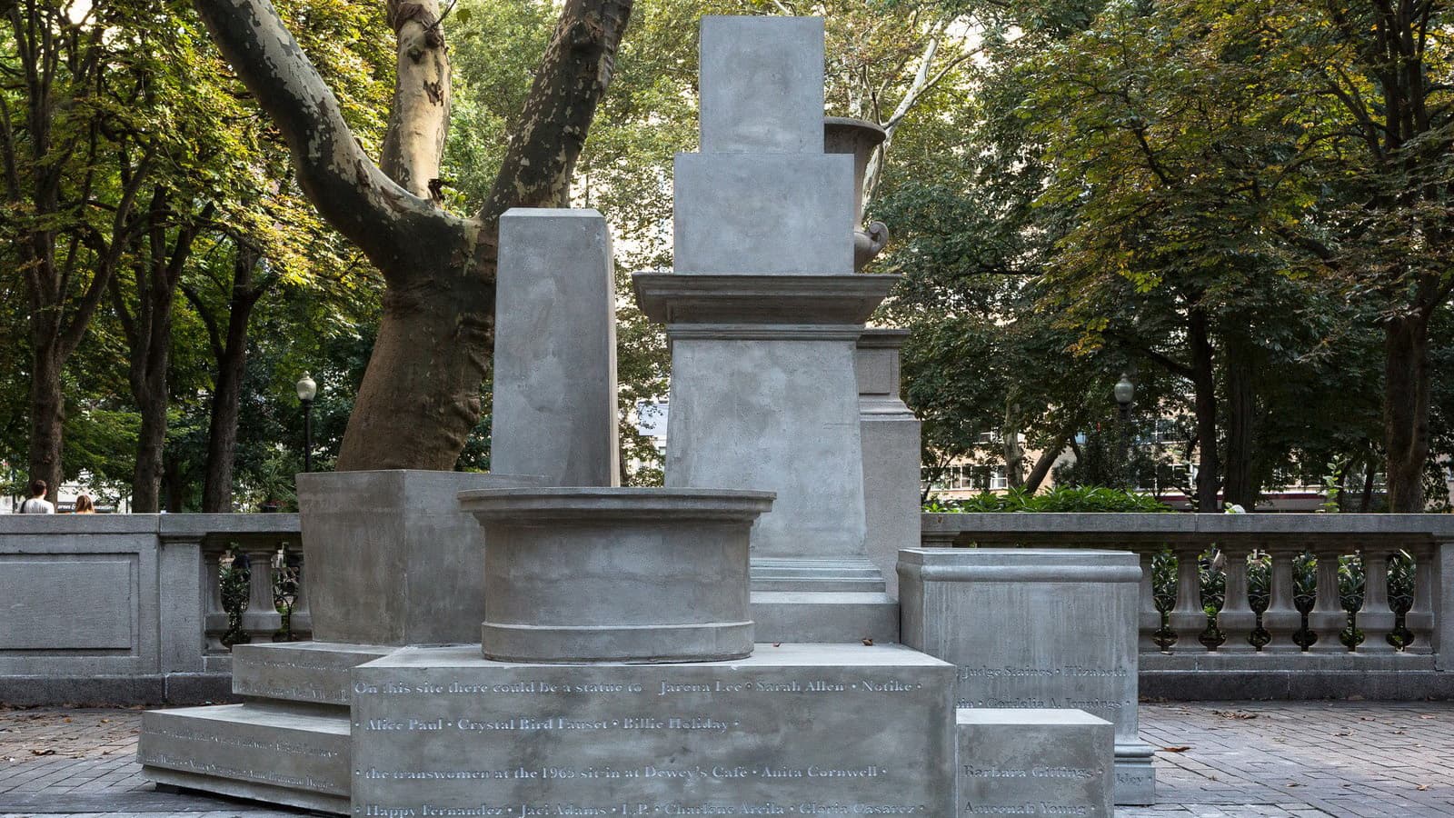 A public sculpture by Sharon Hayes composed of nine bare concrete pedestals.