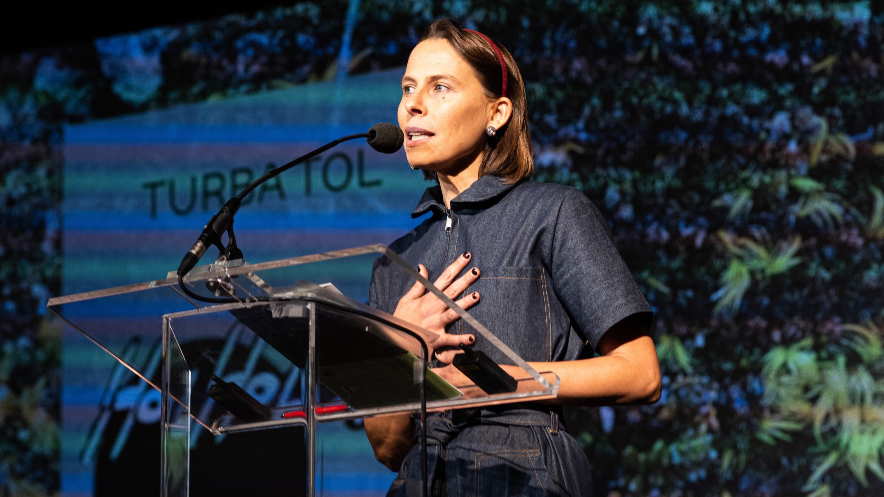 Camila Marambio speaking at The World Around Summit 2022.